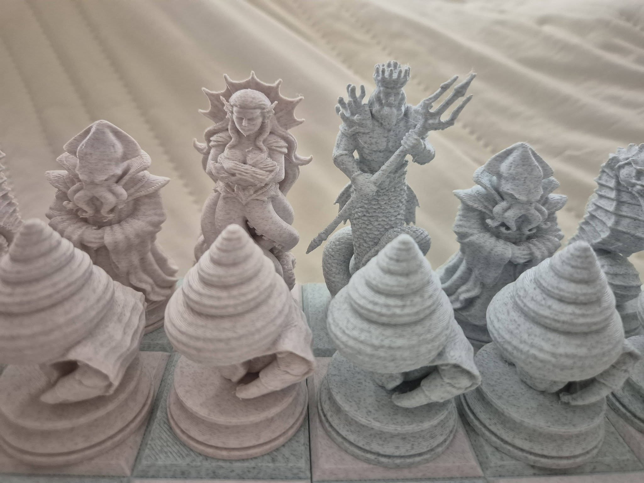 Sea-themed chess set pieces