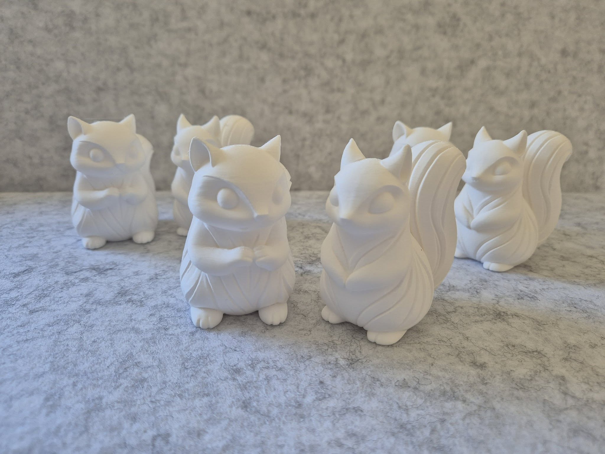 3D-printed squirrel figurines
